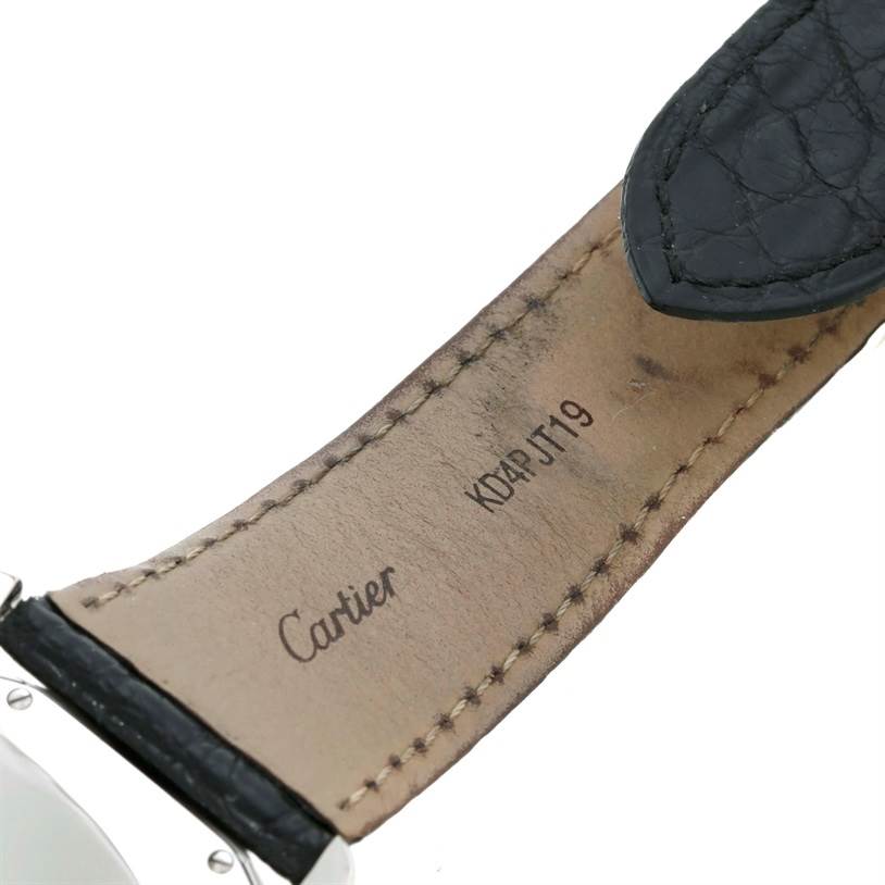 The image shows the underside of the strap of a Ronde model by Cartier, highlighting the stitching and brand inscription.