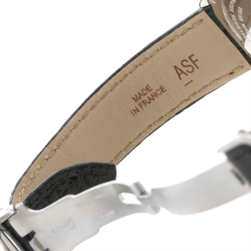 The image shows the inside of the strap and the clasp of the Ronde model by Cartier, with engraving indicating it
s made in France.