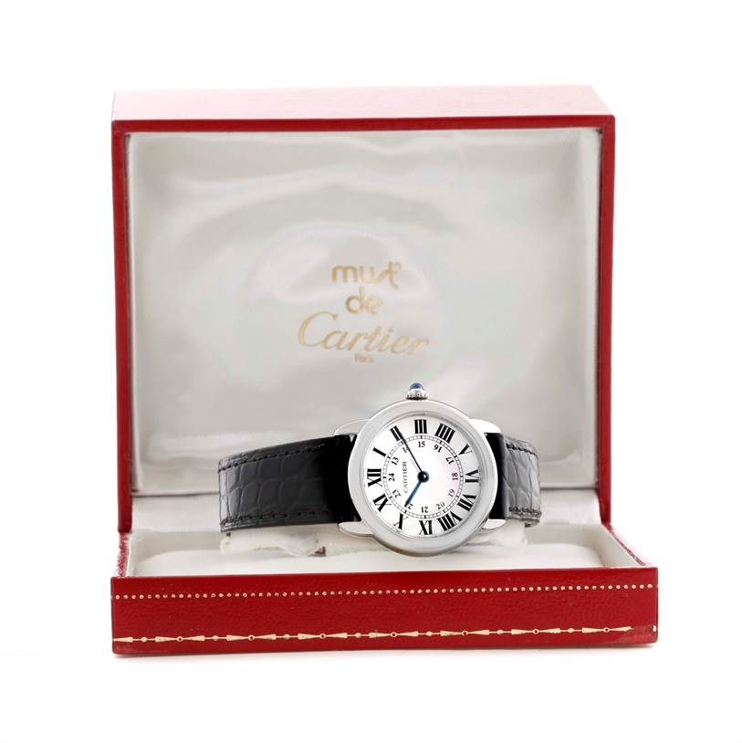 The Cartier Ronde W6700155 Women
s Stainless Steel Silver Dial W6700155 Women
s Stainless Steel Silver Dial watch is shown from the front, placed in its open red and white box.