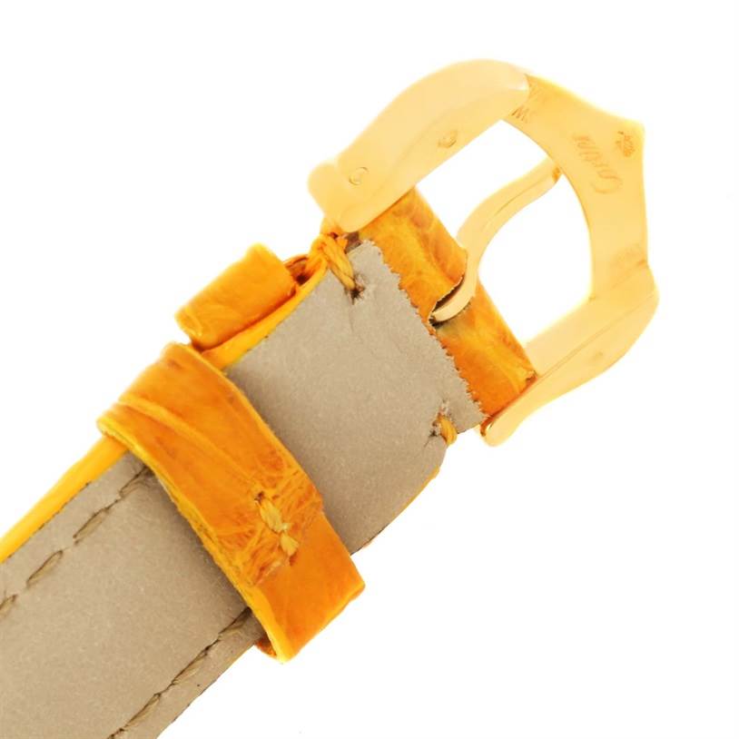 This image shows the buckle and part of the strap of a Ronde model watch by Cartier, viewed at an angle highlighting the clasp.