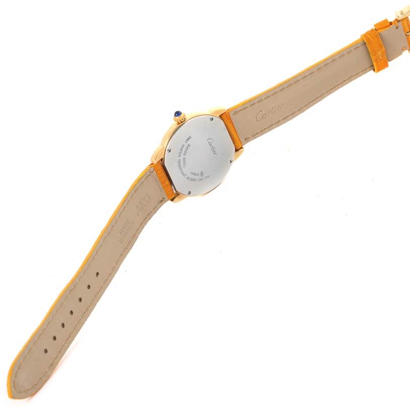 The image shows the back and strap of the Cartier Ronde W6700355 Women's Steel and Gold (two tone) Silver Dial W6700355 Women's Steel and Gold (two tone) Silver Dial watch, highlighting the engraved case back and leather strap.