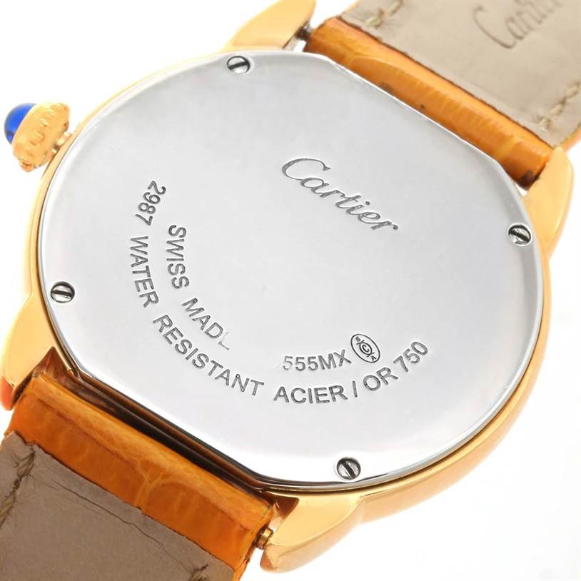 This image shows the back case and part of the strap of a Cartier Ronde W6700355 Women's Steel and Gold (two tone) Silver Dial W6700355 Women's Steel and Gold (two tone) Silver Dial model watch from a close-up, angled shot.