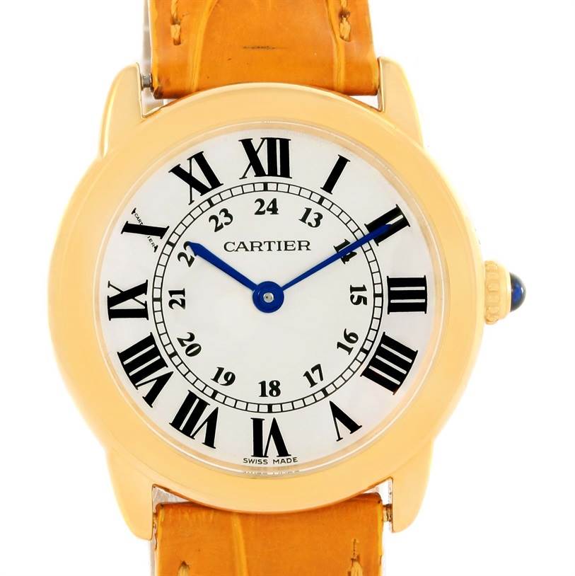 The image shows a front view of the Cartier Ronde W6700355 Women's Steel and Gold (two tone) Silver Dial W6700355 Women's Steel and Gold (two tone) Silver Dial watch, displaying its face, Roman numerals, blue hands, and leather strap.