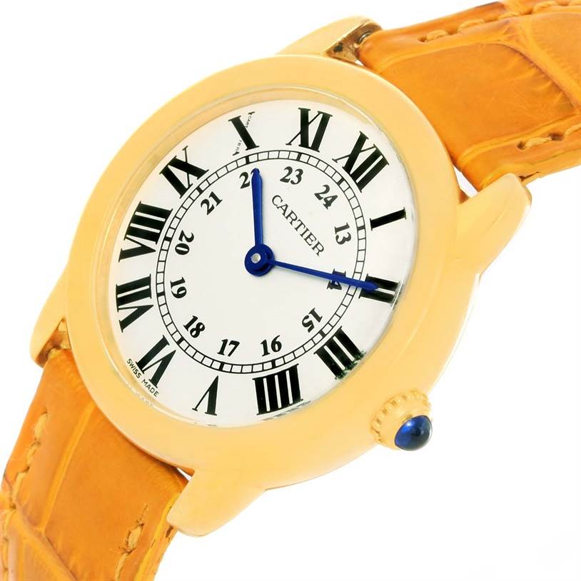 The image shows a close-up of the Cartier Ronde W6700355 Women's Steel and Gold (two tone) Silver Dial W6700355 Women's Steel and Gold (two tone) Silver Dial watch face, crown, and part of the tan leather strap.