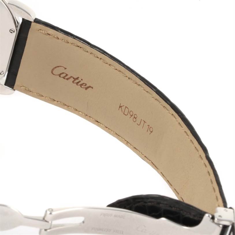 The image shows the inner side of the strap and clasp of a Cartier Ronde W6700255 Stainless Steel Silver Dial W6700255 Stainless Steel Silver Dial watch, highlighting the brand logo and serial number.