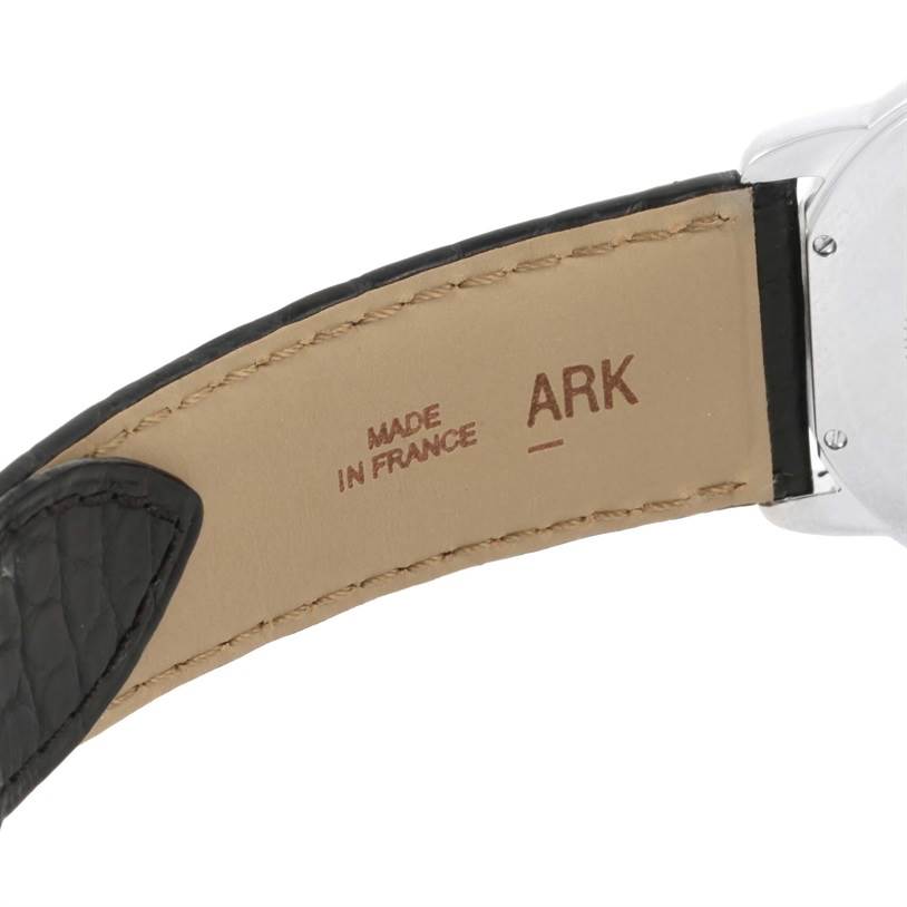 The image shows the inner side of the strap and part of the case of a Ronde model watch by Cartier.