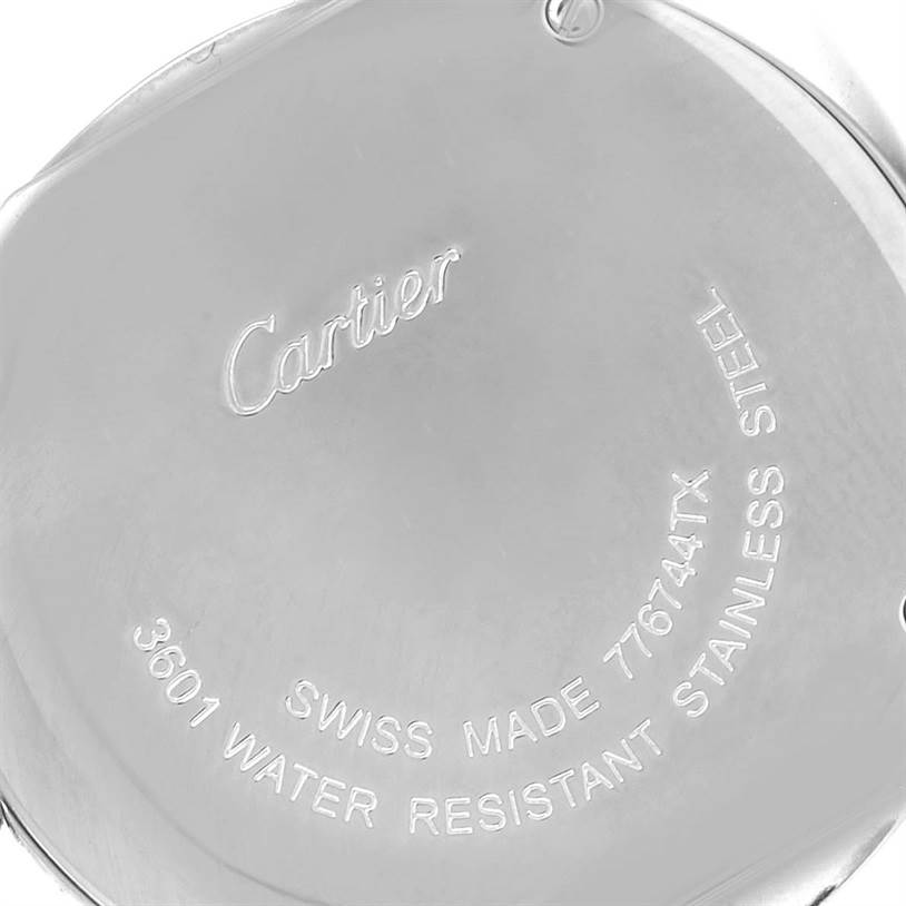 This image shows the back case of the Cartier Ronde W6701004 Women
s Stainless Steel Silver Dial W6701004 Women
s Stainless Steel Silver Dial watch, highlighting the engravings and markings.