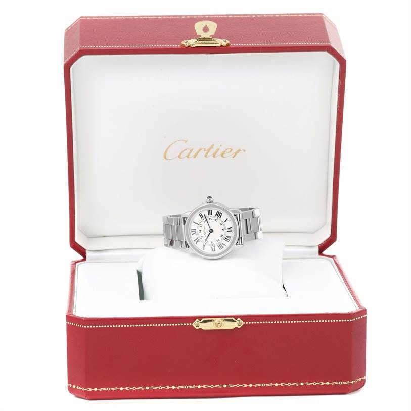 The Cartier Ronde W6701004 Women
s Stainless Steel Silver Dial W6701004 Women
s Stainless Steel Silver Dial model watch is displayed head-on in an open red, gold-trimmed Cartier box.