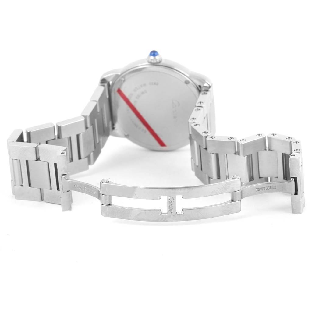 The image shows the back of the Cartier Ronde W6701004 Women
s Stainless Steel Silver Dial W6701004 Women
s Stainless Steel Silver Dial watch and its metal bracelet with the clasp open.