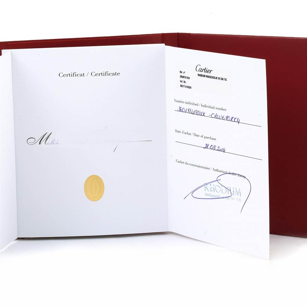 The image shows the certification papers of the Cartier Ronde W6701004 Women's Stainless Steel Silver Dial W6701004 Women's Stainless Steel Silver Dial watch, displayed open in a red folder.