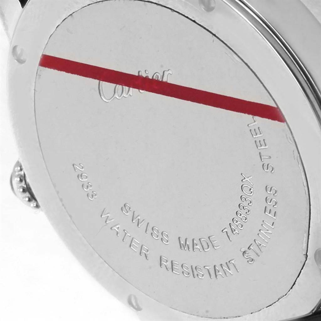 The image shows the back case of a Cartier Ronde W6701004 Women's Stainless Steel Silver Dial W6701004 Women's Stainless Steel Silver Dial watch at a close-up angle, highlighting its engraved details.