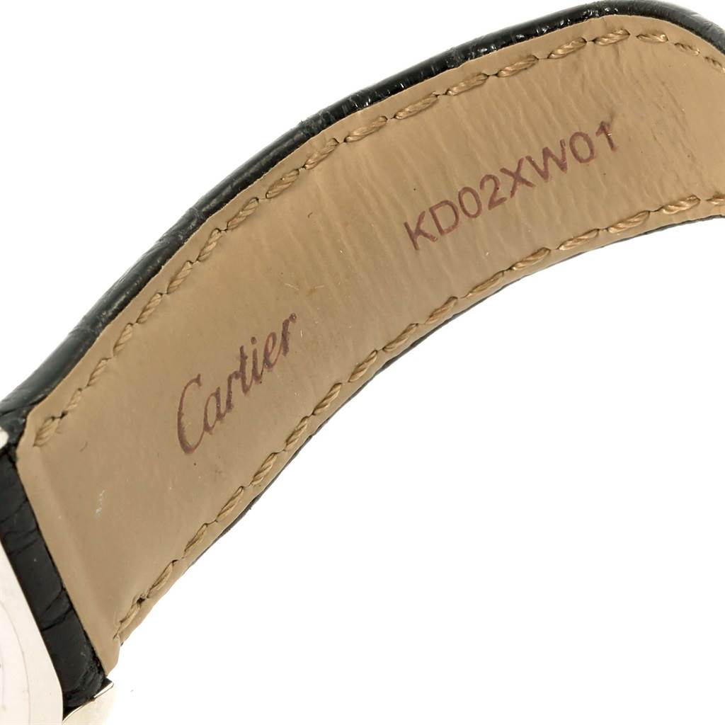 The image shows the inner side of a leather strap of a Cartier Ronde W6700155 Women's Stainless Steel Silver Dial W6700155 Women's Stainless Steel Silver Dial watch, displaying the brand name and model code.