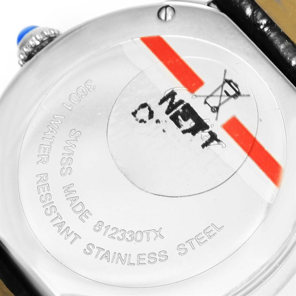 The image shows the back case of the Ronde model by Cartier, highlighting its inscriptions and stainless steel design.