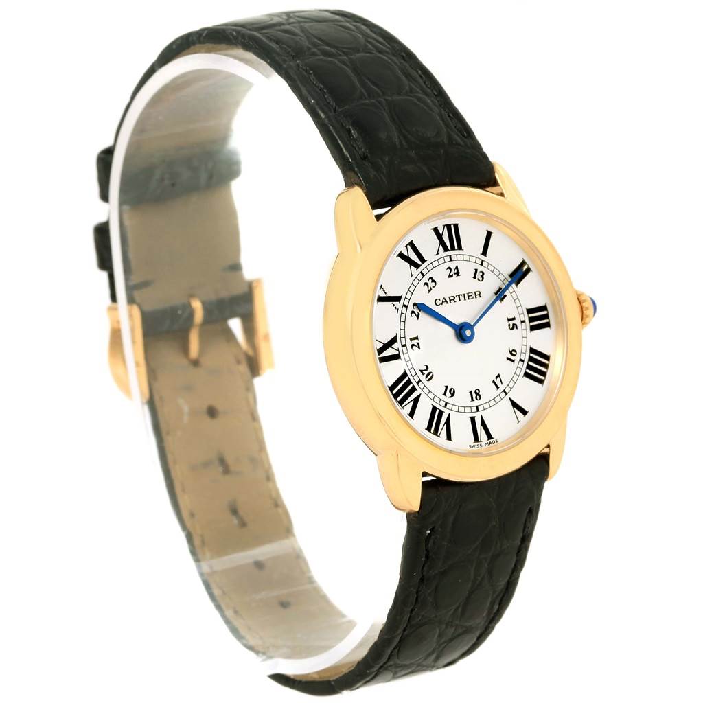 The image shows a side angle of a Cartier Ronde W6700355 Women
s Steel and Gold (two tone) Silver Dial W6700355 Women
s Steel and Gold (two tone) Silver Dial watch, displaying the face, bezel, and black leather strap.
