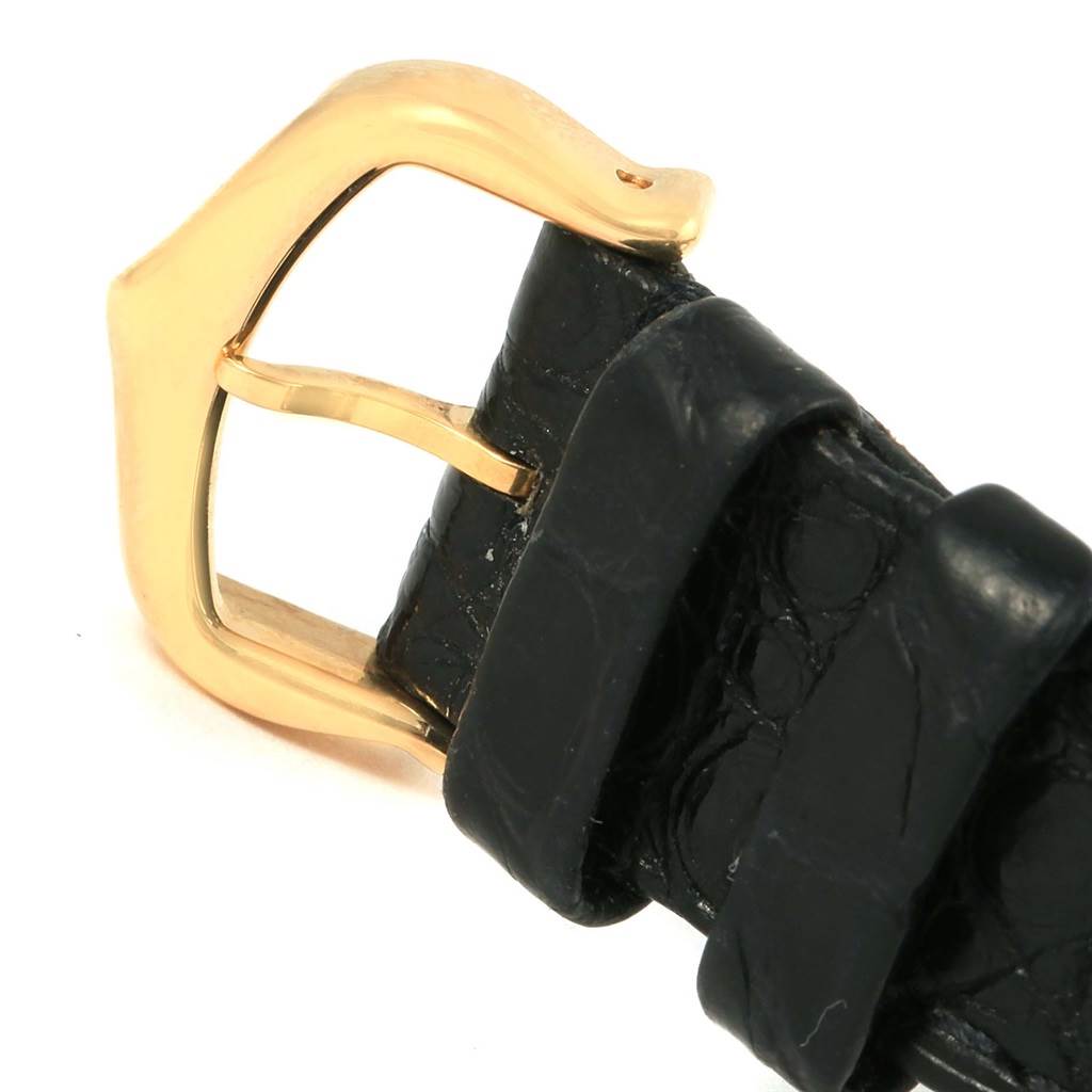 This image shows a close-up view of the black leather strap and gold buckle of the Cartier Ronde W6700355 Women
s Steel and Gold (two tone) Silver Dial W6700355 Women
s Steel and Gold (two tone) Silver Dial watch.