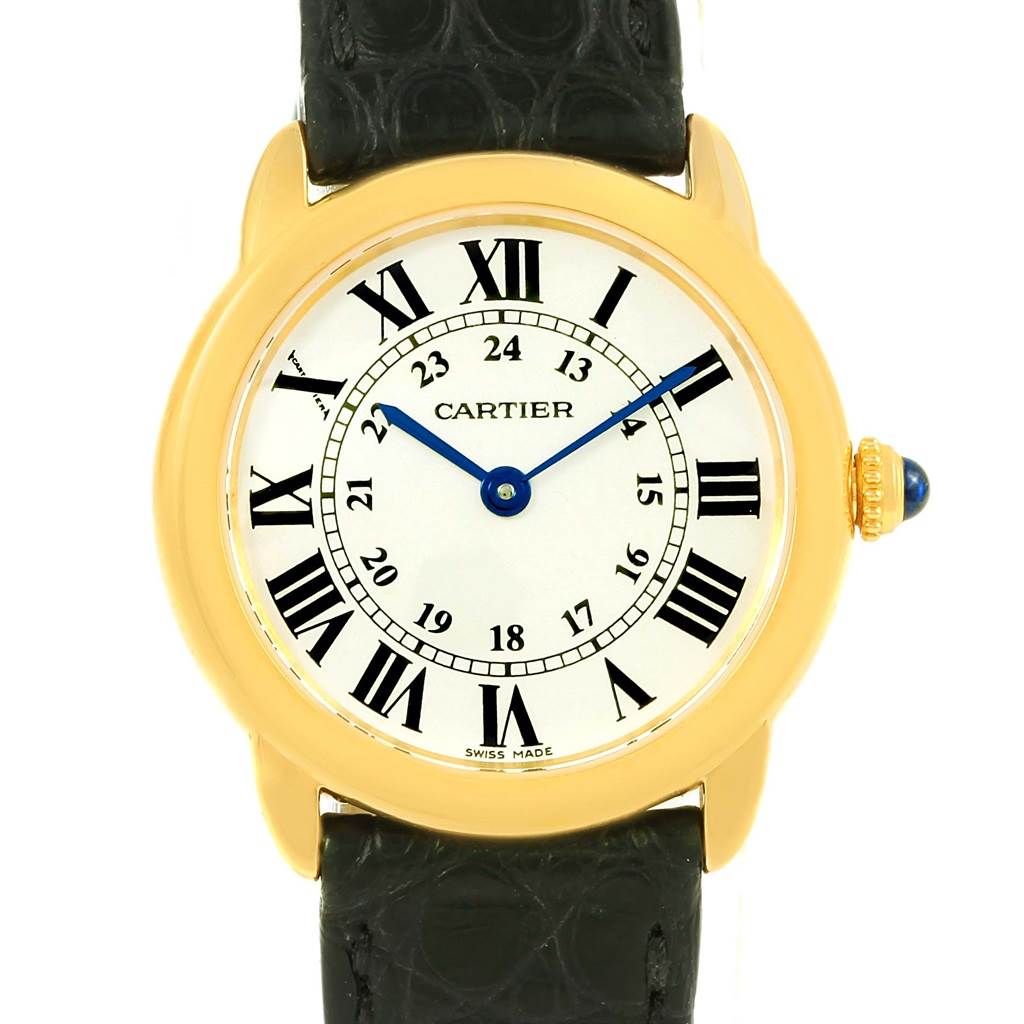 This image shows a front view of a Cartier Ronde W6700355 Women
s Steel and Gold (two tone) Silver Dial W6700355 Women
s Steel and Gold (two tone) Silver Dial model watch, featuring a gold bezel, Roman numeral dial, and black leather strap.