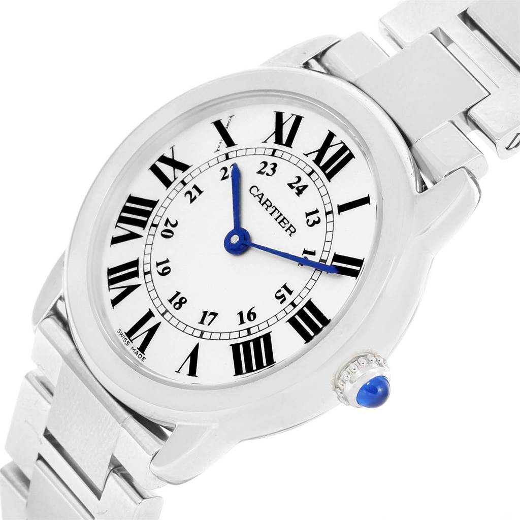 This image shows an angled view of the Cartier Ronde W6701004 Women
s Stainless Steel Silver Dial W6701004 Women
s Stainless Steel Silver Dial model watch, displaying the face, bracelet, and crown with blue cabochon.