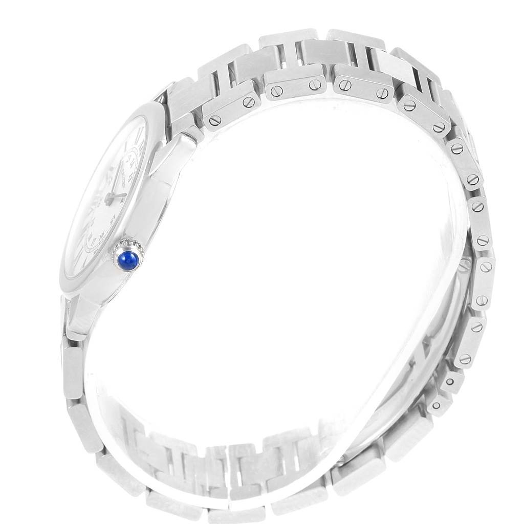 The image shows a side view of the Cartier Ronde W6701004 Women
s Stainless Steel Silver Dial W6701004 Women
s Stainless Steel Silver Dial watch, highlighting the bracelet links and the crown with a blue cabochon.