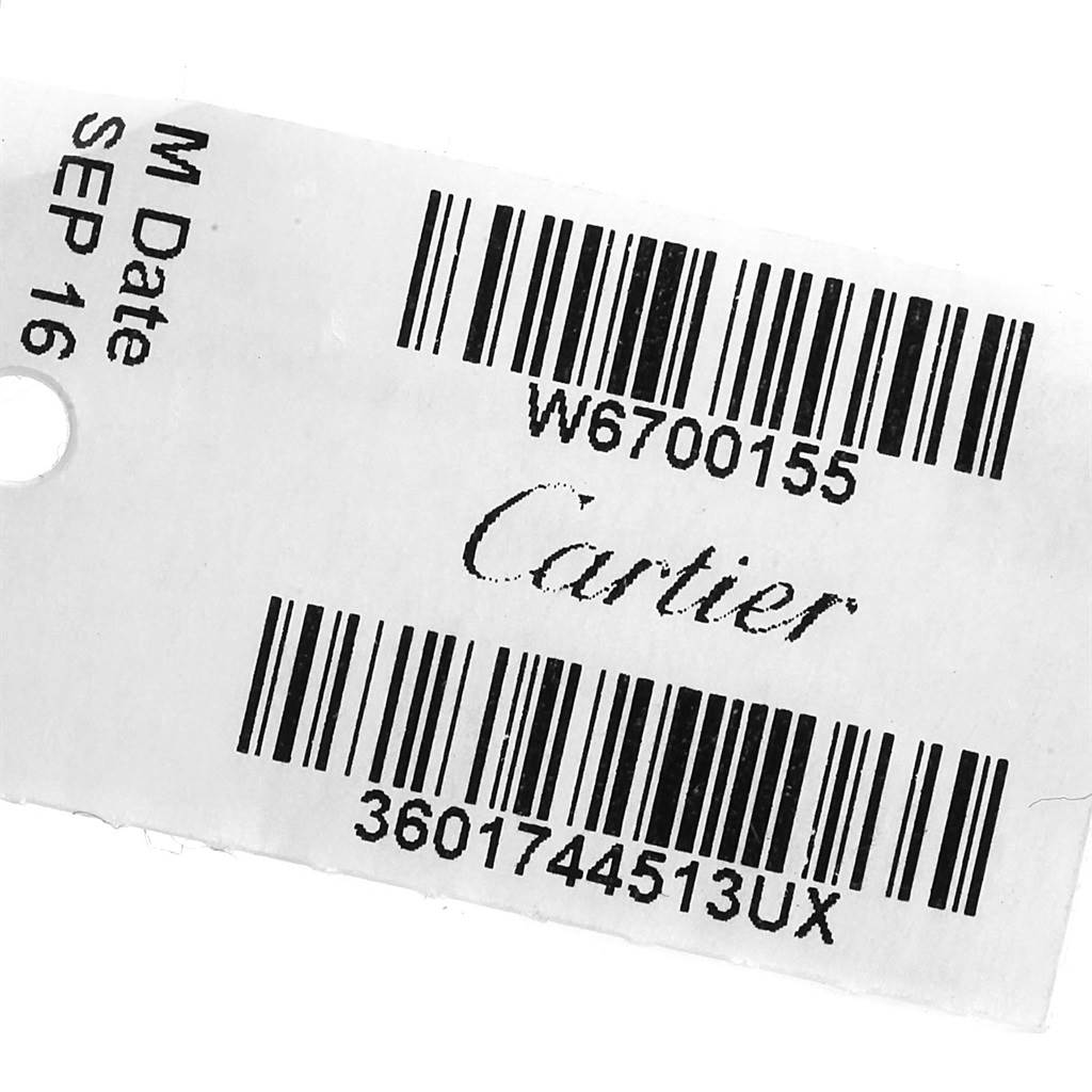 The image shows the tag for a Cartier Ronde W6700155 Women's Stainless Steel Silver Dial W6700155 Women's Stainless Steel Silver Dial model watch with a barcode and date.