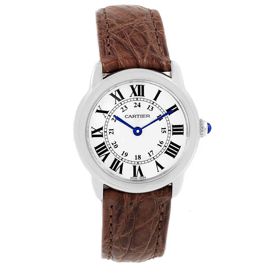 The image shows a front view of the Cartier Ronde W6700155 Women
s Stainless Steel Silver Dial W6700155 Women
s Stainless Steel Silver Dial model watch with a brown leather strap and Roman numerals on the dial.