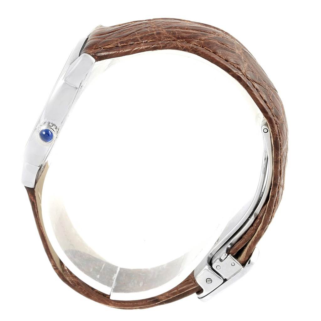 This image shows a side view of a Cartier Ronde W6700155 Women
s Stainless Steel Silver Dial W6700155 Women
s Stainless Steel Silver Dial watch highlighting the crown and leather strap.