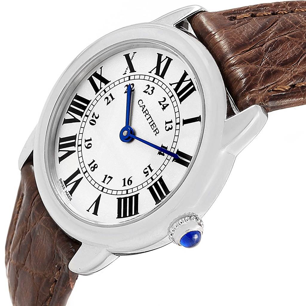 The image shows the face and crown of a Cartier Ronde W6700155 Women
s Stainless Steel Silver Dial W6700155 Women
s Stainless Steel Silver Dial watch at an angle.