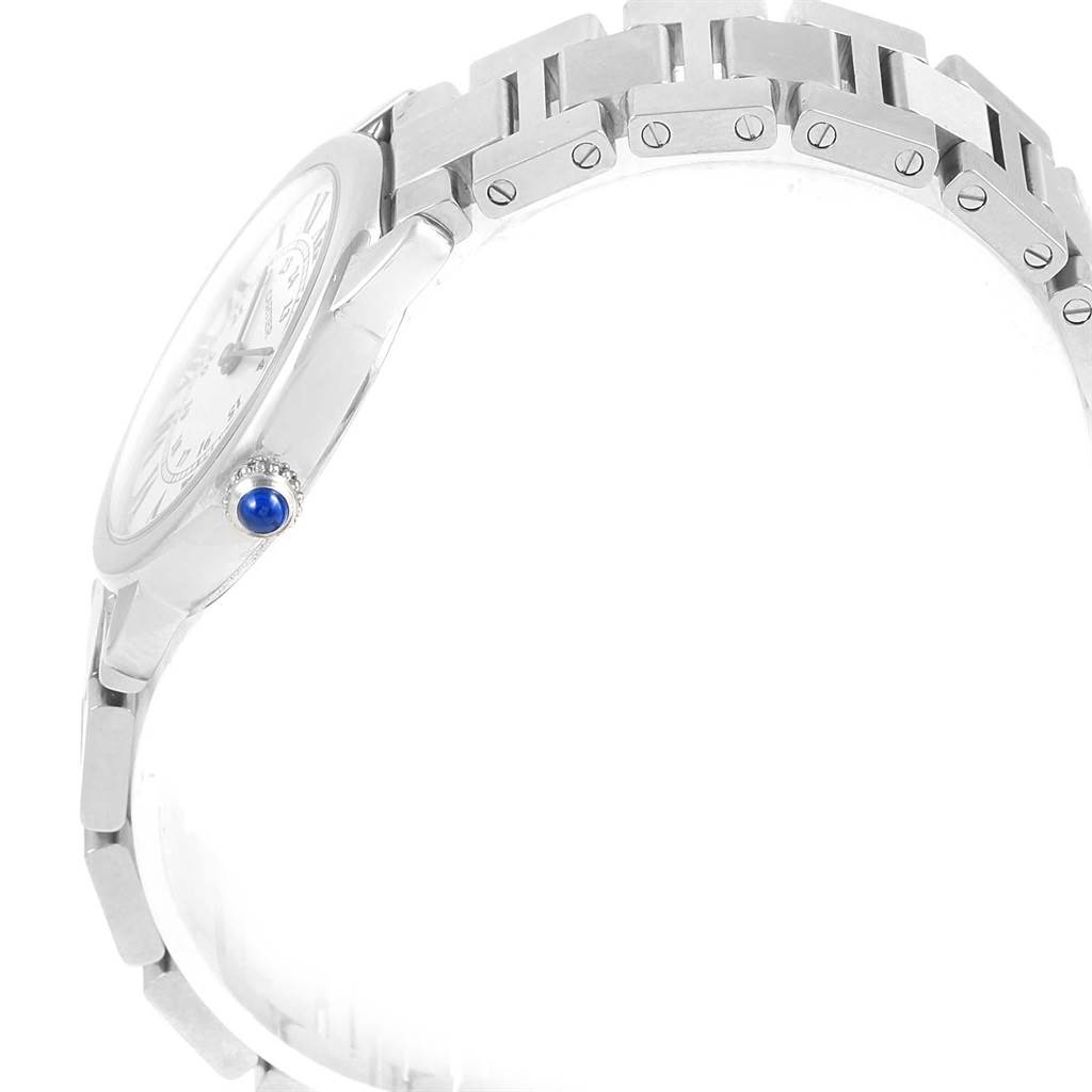 The image shows a side view of a Ronde model by Cartier, highlighting the watch's crown and bracelet links.