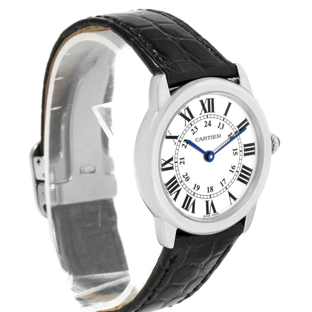 This image shows the Cartier Ronde W6700155 Women's Stainless Steel Silver Dial W6700155 Women's Stainless Steel Silver Dial watch from a side angle, highlighting its black leather strap and white dial with Roman numerals.