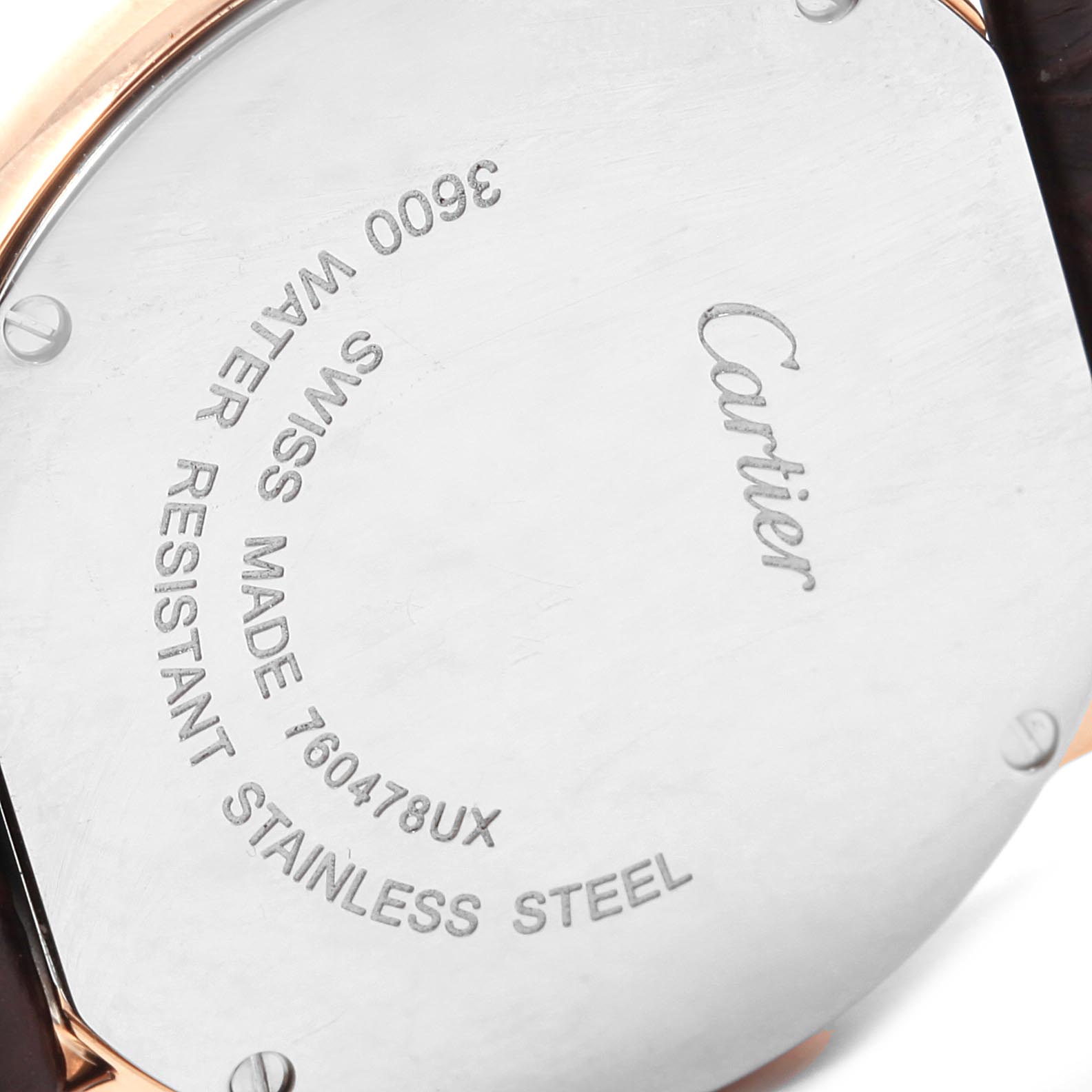 This image shows the back case of a Cartier Ronde W6701007 Women's Steel and Gold (two tone) Silver Dial W6701007 Women's Steel and Gold (two tone) Silver Dial watch, highlighting its engravings and material details.