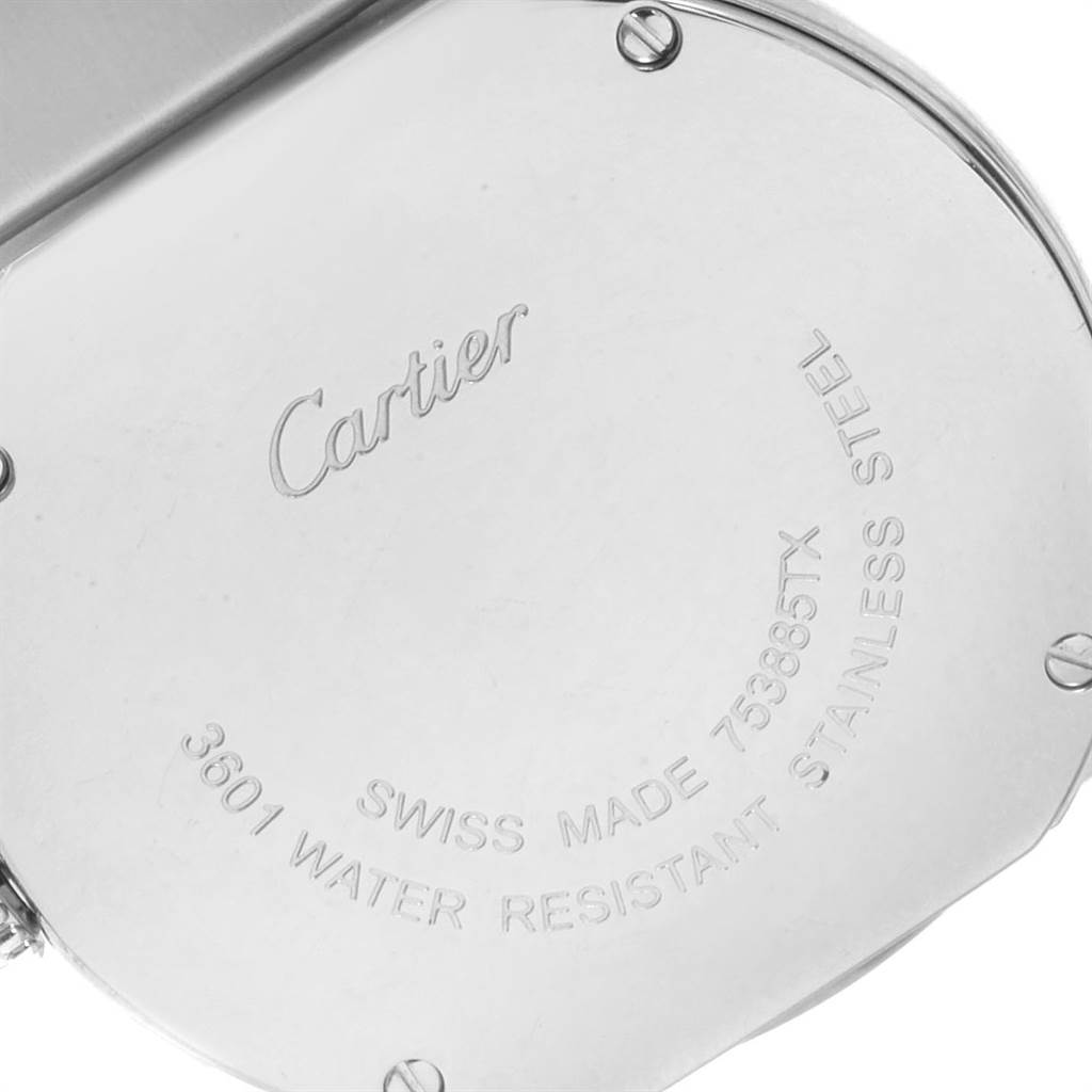 The image shows the back case of a Ronde model watch by Cartier, highlighting the engraved details and screws.