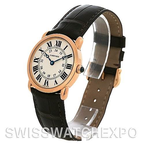 The image shows a side and front angle of the Cartier Ronde W6800151 Women
s Rose Gold Silver Dial W6800151 Women
s Rose Gold Silver Dial model, highlighting its round dial and black leather strap.