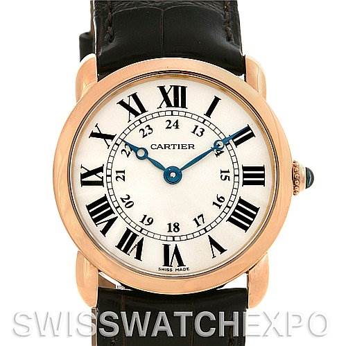 The image shows the face of a Cartier Ronde W6800151 Women
s Rose Gold Silver Dial W6800151 Women
s Rose Gold Silver Dial model watch, focusing on the dial, hands, and part of the leather strap.