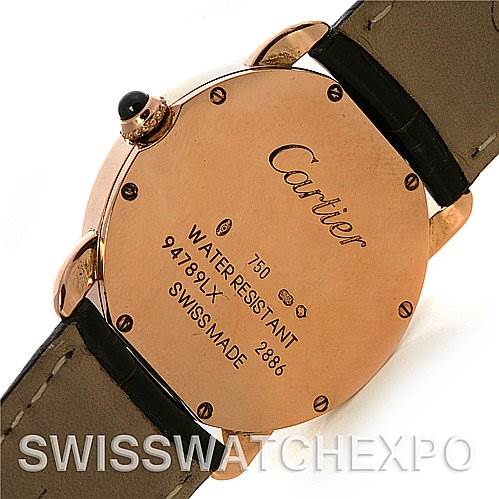 The image shows the back case of a Cartier Ronde W6800151 Women
s Rose Gold Silver Dial W6800151 Women
s Rose Gold Silver Dial watch, highlighting the inscriptions and leather straps.
