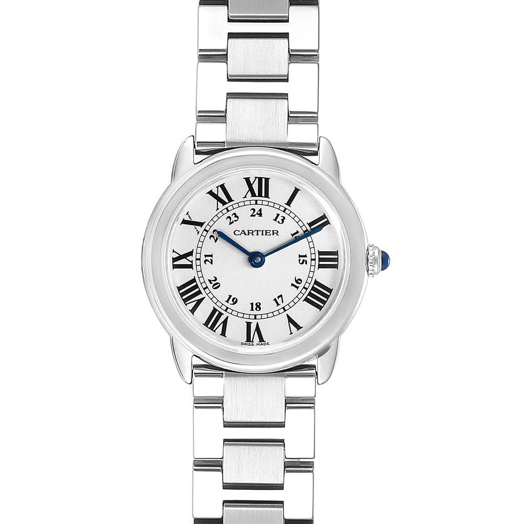 The image shows a Ronde model watch by Cartier from the front, featuring its dial, bracelet, and crown with a blue accent.
