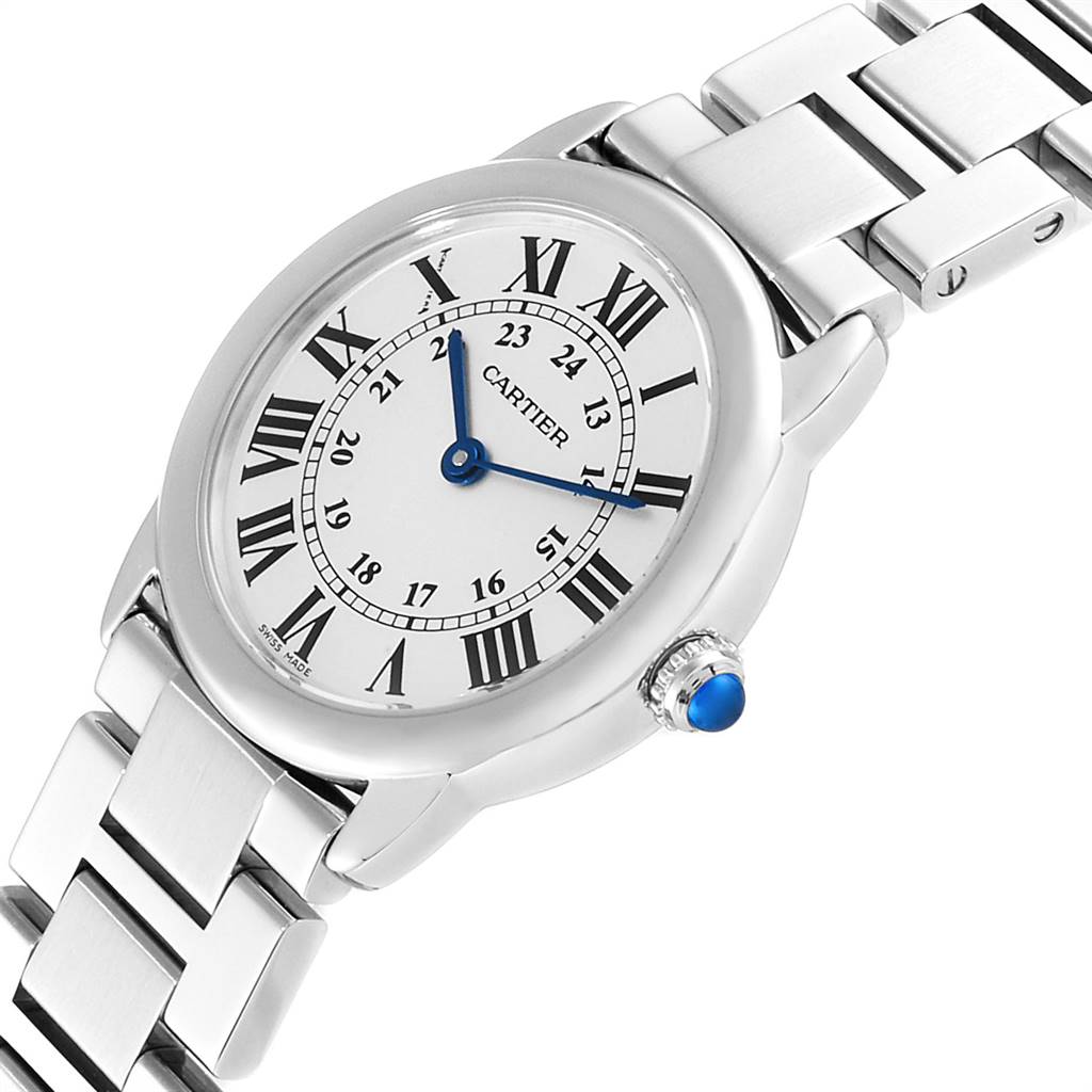 The image shows a close-up angle of the Cartier Ronde W6701004 Women's Stainless Steel Silver Dial W6701004 Women's Stainless Steel Silver Dial watch, highlighting its face, bezel, crown, and metal bracelet.