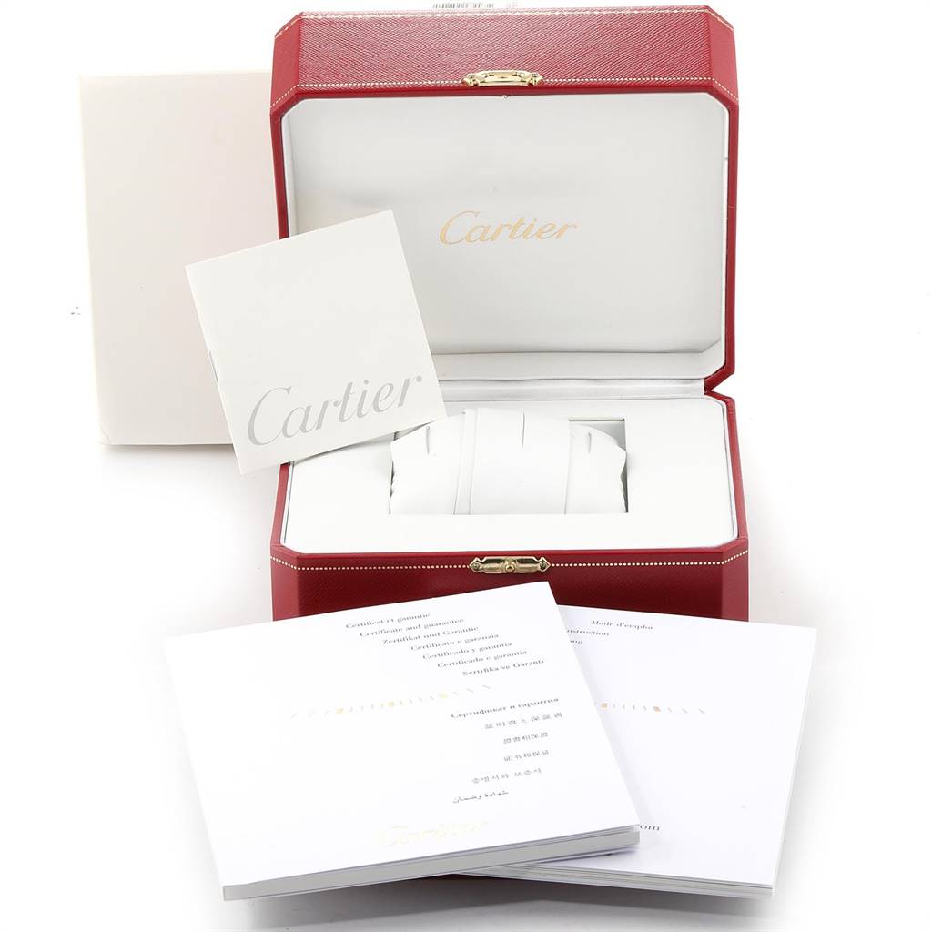 The image shows the packaging and manuals of the Cartier Ronde W6700255 Stainless Steel Silver Dial W6700255 Stainless Steel Silver Dial watch, including a red watch box and documents.