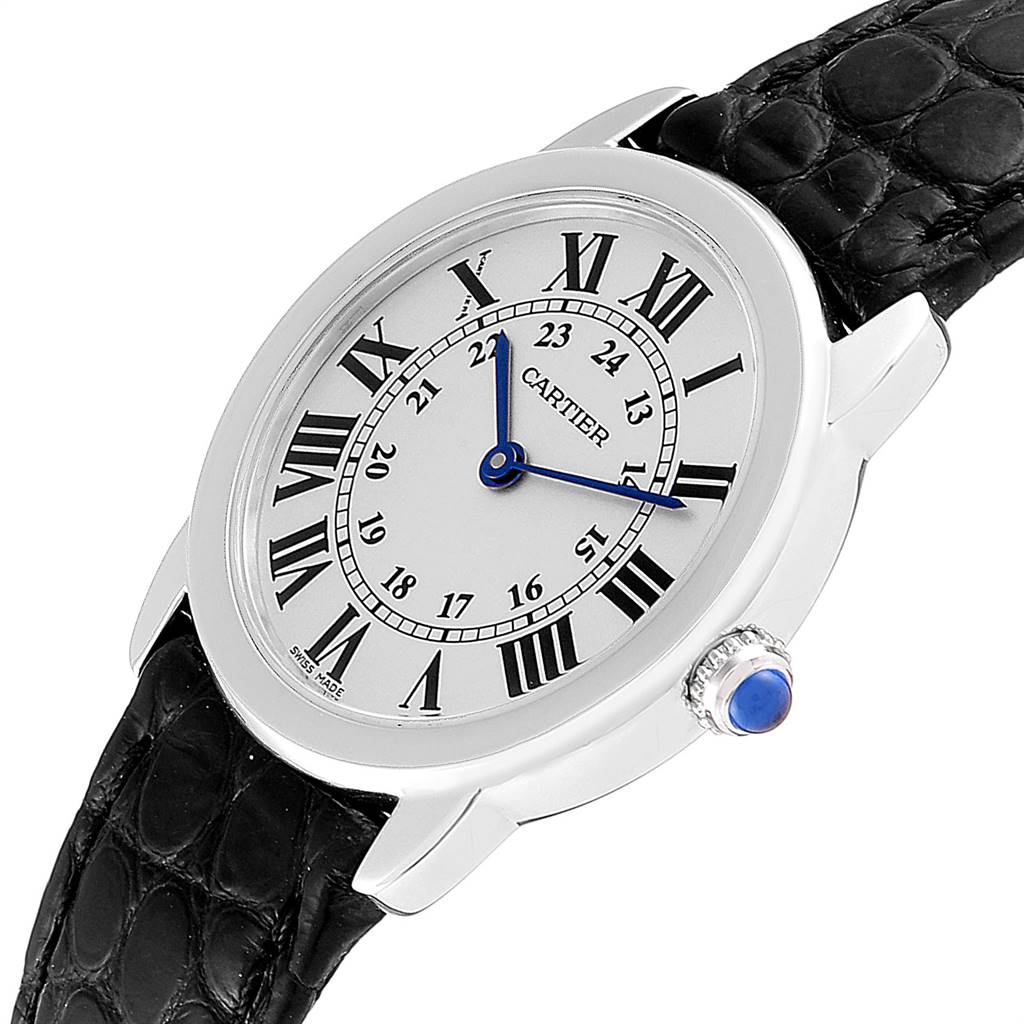 The image shows a Cartier Ronde W6700155 Women's Stainless Steel Silver Dial W6700155 Women's Stainless Steel Silver Dial watch at an angle highlighting its face, black leather strap, and blue cabochon on the crown.