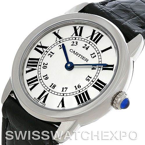 This image shows the Cartier Ronde W6700155 Women's Stainless Steel Silver Dial W6700155 Women's Stainless Steel Silver Dial model watch from an angle displaying its face, bezel, crown, and part of the strap.