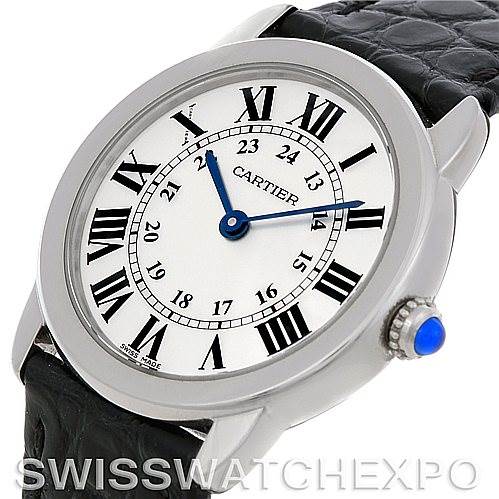 This image shows the Cartier Ronde W6700155 Women's Stainless Steel Silver Dial W6700155 Women's Stainless Steel Silver Dial model watch at an angle highlighting its face, bezel, crown, and part of the leather strap.