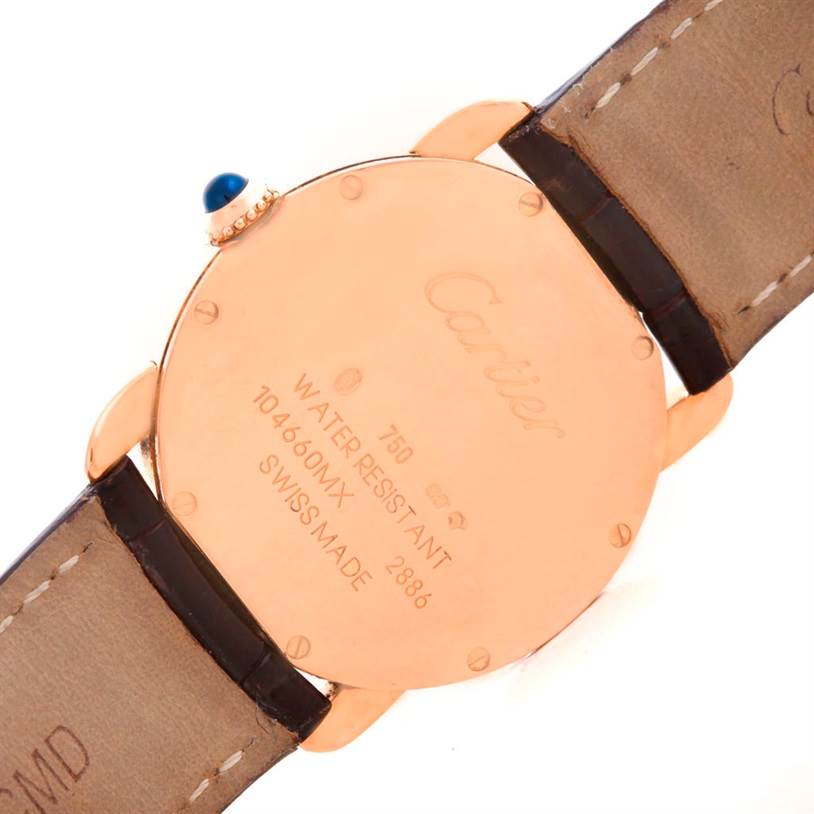 This image shows the back case and straps of the Cartier Ronde W6800151 Women
s Rose Gold Silver Dial W6800151 Women
s Rose Gold Silver Dial watch, highlighting the water-resistant markings and serial number.