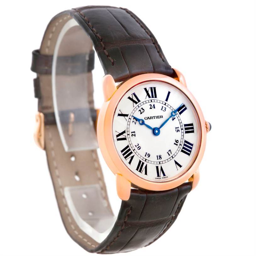 The image shows a Cartier Ronde W6800151 Women
s Rose Gold Silver Dial W6800151 Women
s Rose Gold Silver Dial model watch at a slight angle, highlighting its face, Roman numerals, and leather strap.