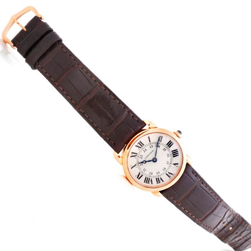 A top-down view of a Cartier Ronde W6800151 Women
s Rose Gold Silver Dial W6800151 Women
s Rose Gold Silver Dial watch shows the full face, strap, and buckle.