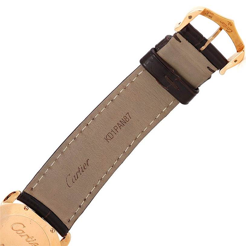 This image shows the back of the strap and buckle of a Ronde model watch by Cartier at an angled top view.