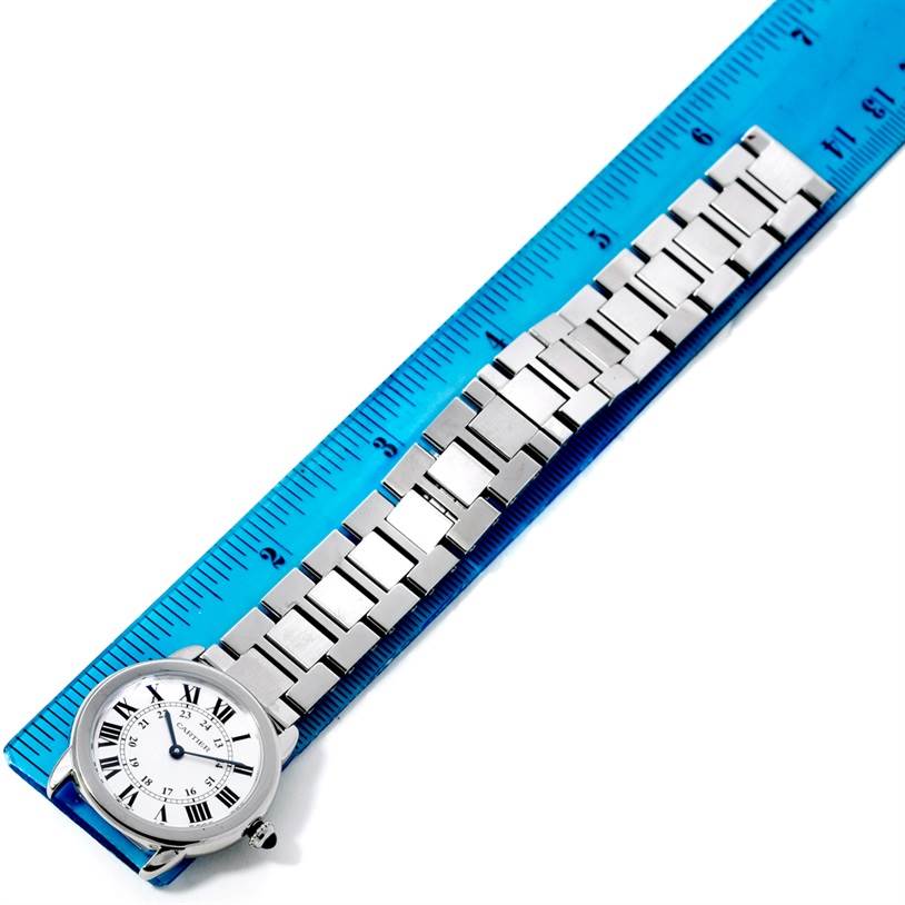 The image shows a Cartier Ronde W6701004 Women's Stainless Steel Silver Dial W6701004 Women's Stainless Steel Silver Dial watch with a full view of the face and band, alongside a measurement ruler.