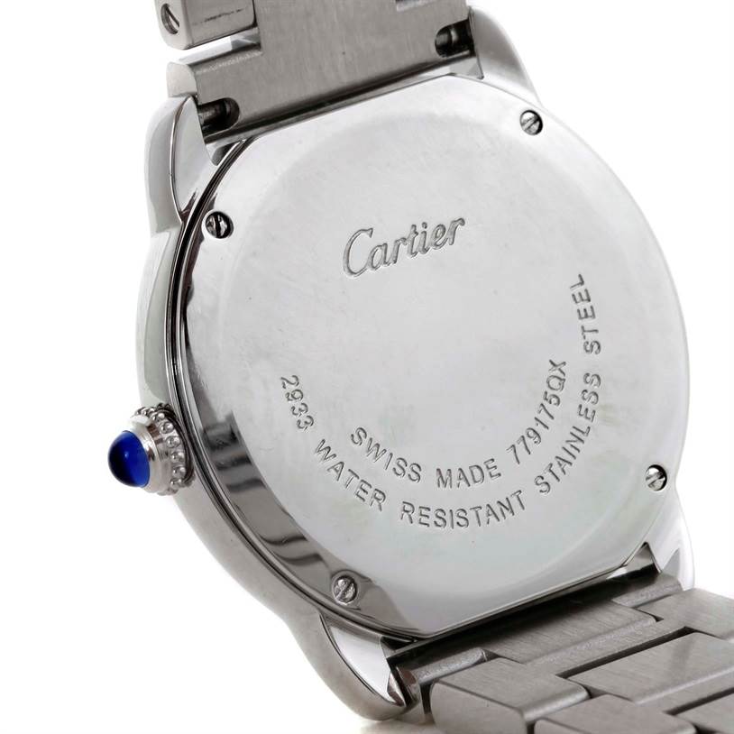 The image shows the back case of the Ronde model by Cartier, including the crown and part of the bracelet.