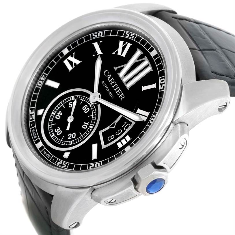 The image shows a Calibre de Cartier watch by Cartier from a side angle, highlighting the dial, crown, and part of the strap.