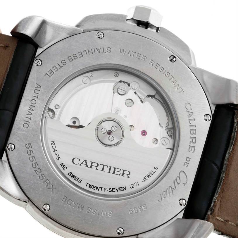 This image shows the back view of the Calibre de Cartier watch by Cartier, highlighting its automatic movement and inner mechanics.