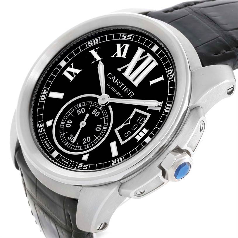 The image shows a close-up of the Calibre de Cartier watch dial and case, highlighting the crown and side profile.