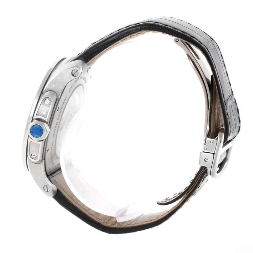This image shows the side profile of the Calibre de Cartier watch by Cartier, highlighting the crown, case, and strap.