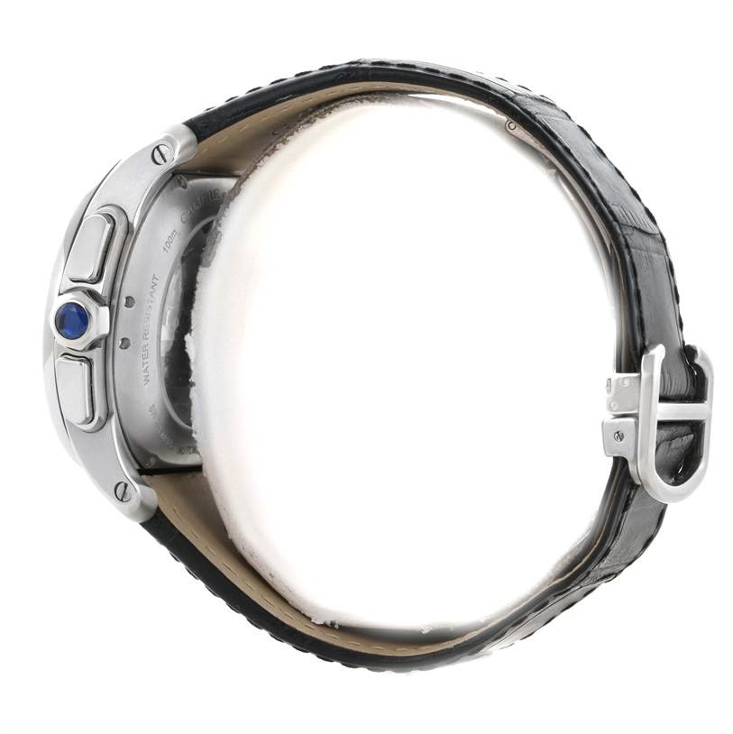 The image shows a side view of a Calibre de Cartier watch by Cartier, including the buckle, strap, and crown.